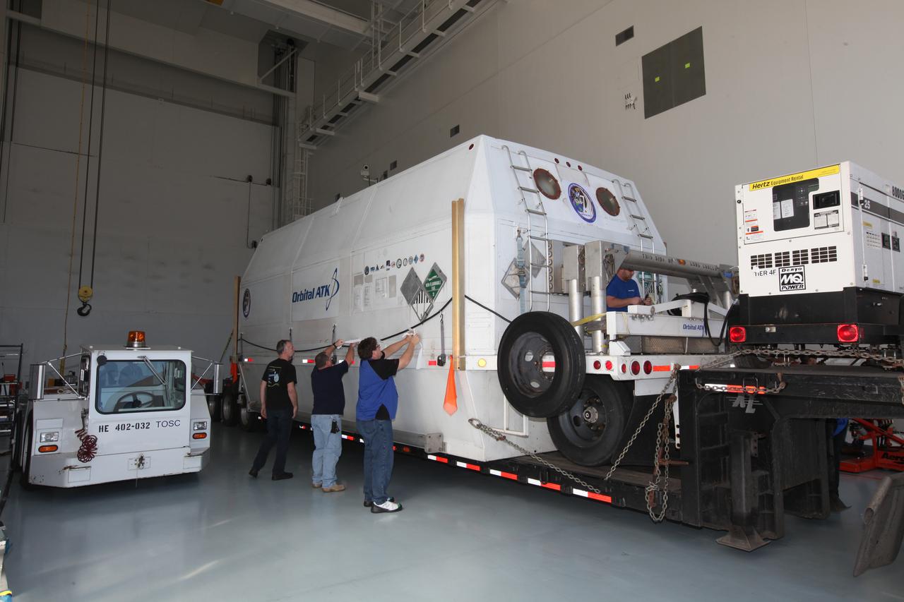 The Orbital ATK OA-7 Cygnus spacecraft's service module arrives inside the Space Station Processing Facility of NASA's Kennedy Space Center in Florida. The service module is sealed in an environmentally controlled shipping container, pulled in by truck on a low-boy flatbed trailer. Scheduled to launch on March 19, 2017, the Orbital ATK OA-7 mission will lift off atop a United Launch Alliance Atlas V rocket from Space launch Complex 41 at Cape Canaveral Air Force Station. The commercial resupply services mission to the International Space Station will deliver thousands of pounds of supplies, equipment and scientific research materials that improve life on Earth and drive progress toward future space exploration.