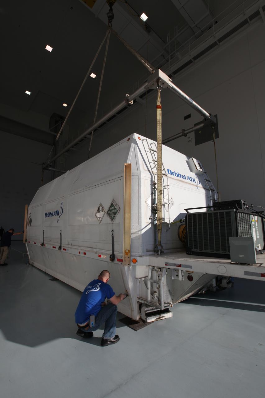 A crane is used to lift the Orbital ATK OA-7 Cygnus spacecraft's service module off a flatbed truck after arrival at the Space Station Processing Facility of NASA's Kennedy Space Center in Florida. The service module is sealed in an environmentally controlled shipping container. Scheduled to launch on March 19, 2017, the Orbital ATK OA-7 mission will lift off atop a United Launch Alliance Atlas V rocket from Space launch Complex 41 at Cape Canaveral Air Force Station. The commercial resupply services mission to the International Space Station will deliver thousands of pounds of supplies, equipment and scientific research materials that improve life on Earth and drive progress toward future space exploration.
