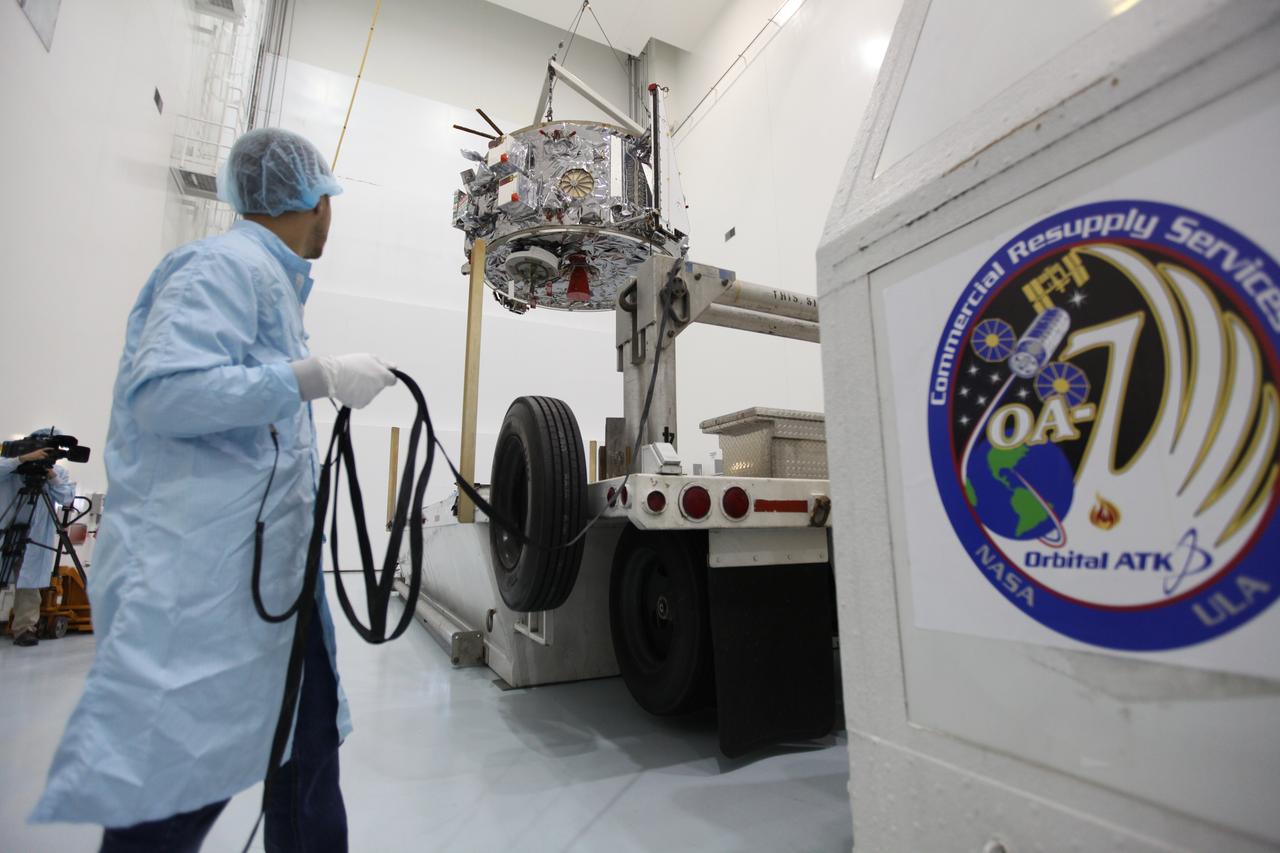 Inside the Space Station Processing Facility at NASA's Kennedy Space Center in Florida, Engineers and technicians use a crane to lift the Orbital ATK OA-7 Cygnus spacecraft's service module from its shipping container. Scheduled to launch on March 19, 2017, the Orbital ATK OA-7 mission will lift off atop a United Launch Alliance Atlas V rocket from Space launch Complex 41 at Cape Canaveral Air Force Station. The commercial resupply services mission to the International Space Station will deliver thousands of pounds of supplies, equipment and scientific research materials that improve life on Earth and drive progress toward future space exploration.