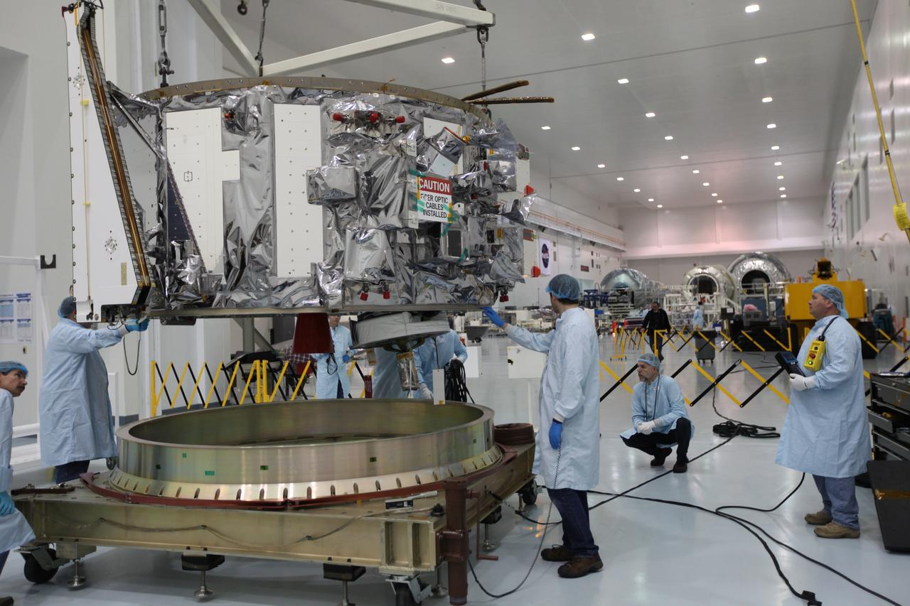 Inside the Space Station Processing Facility at NASA's Kennedy Space Center in Florida, Engineers and technicians use a crane to move the Orbital ATK OA-7 Cygnus spacecraft's service module to a test stand. Scheduled to launch on March 19, 2017, the Orbital ATK OA-7 mission will lift off atop a United Launch Alliance Atlas V rocket from Space launch Complex 41 at Cape Canaveral Air Force Station. The commercial resupply services mission to the International Space Station will deliver thousands of pounds of supplies, equipment and scientific research materials that improve life on Earth and drive progress toward future space exploration.