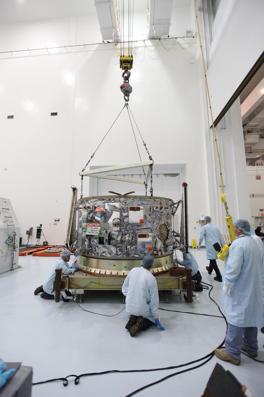 Inside the Space Station Processing Facility at NASA's Kennedy Space Center in Florida, engineers and technicians use a crane to place the Orbital ATK OA-7 Cygnus spacecraft's service module on a test stand. Scheduled to launch on March 19, 2017, the Orbital ATK OA-7 mission will lift off atop a United Launch Alliance Atlas V rocket from Space launch Complex 41 at Cape Canaveral Air Force Station. The commercial resupply services mission to the International Space Station will deliver thousands of pounds of supplies, equipment and scientific research materials that improve life on Earth and drive progress toward future space exploration.