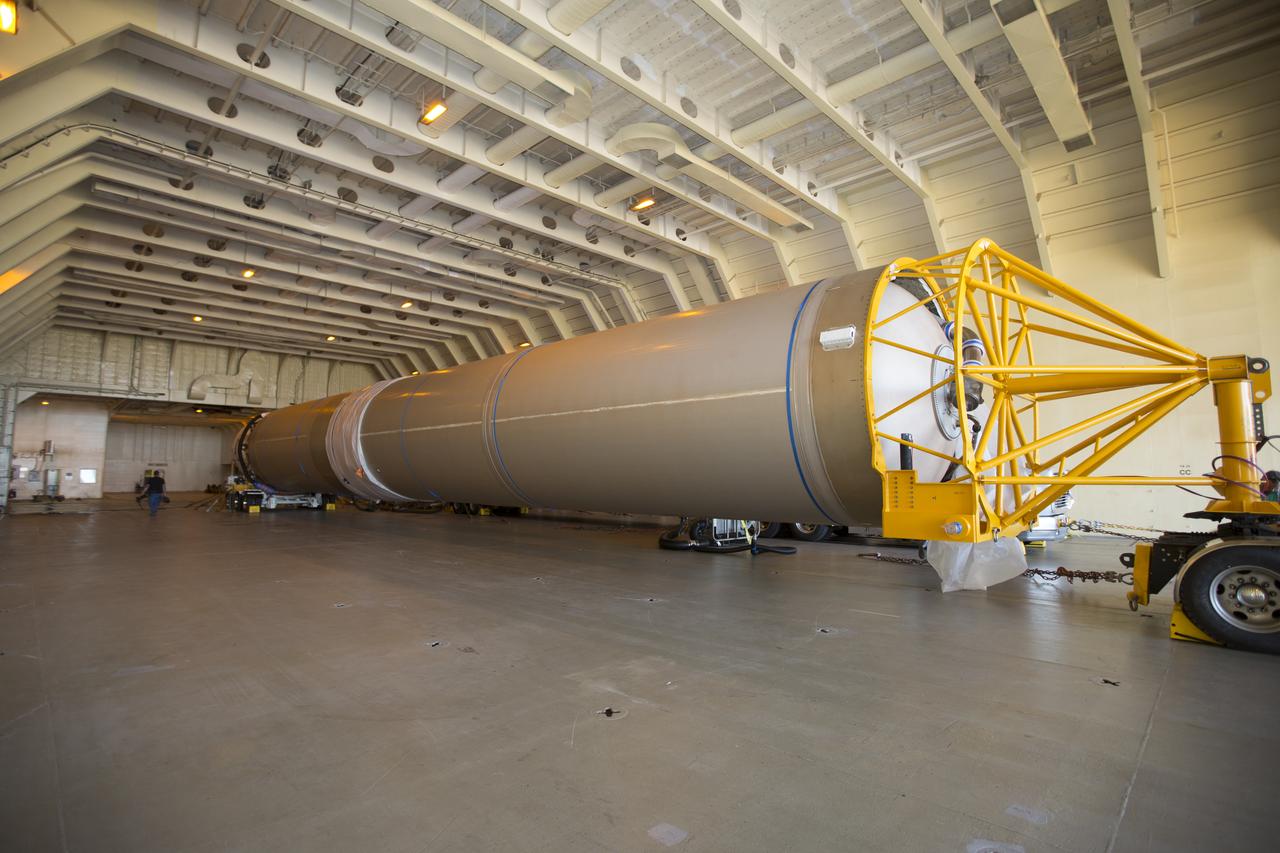 A transport truck is about to take a United Launch Alliance (ULA) Atlas V booster from the Mariner cargo ship at the Army Outpost wharf at Port Canaveral, Florida, to the hangar at the Atlas Spaceflight Operations Center (ASOC), located south of Space Launch Complex 41 at Cape Canaveral Air Force Station. The Atlas V is scheduled to launch a Cygnus spacecraft on the Orbital ATK CRS-7 commercial resupply mission to the International Space Station. Scheduled to liftoff March 19, 2017, the Orbital ATK CRS-7 mission will deliver thousands of pounds of supplies, equipment and scientific research materials that improve life on Earth and drive progress toward future space exploration.