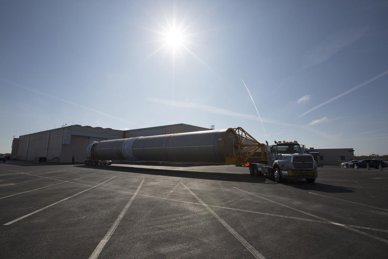 A United Launch Alliance (ULA) Atlas V booster arrives at Cape Canaveral Air Force Station's Atlas Spaceflight Operations Center (ASOC). The Atlas V will undergo final testing in that facility. When processing in the ASOC is complete, the Atlas booster will be moved to the Vertical Integration Facility for stacking at Space Launch Complex 41. Scheduled to launch March 19, 2017, the Atlas will launch a Cygnus spacecraft on the Orbital ATK CRS-7 mission to deliver thousands of pounds of supplies, equipment and scientific research materials to the International Space Station.