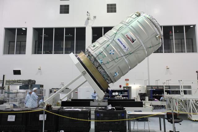 NASA image: OA-7 Cargo Module Rotate to Vertical