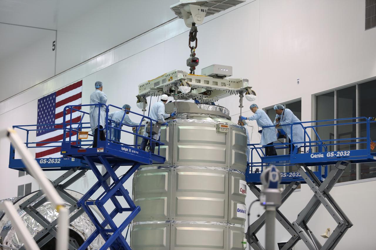 In the Space Station Processing Facility at NASA's Kennedy Space Center in Florida, technicians and engineers prepare a Cygnus spacecraft's pressurized cargo module for mating to its service module. Cygnus is being prepared to deliver thousands of pounds of supplies, equipment and scientific research materials on the Orbital ATK CRS-7 mission to the International Space Station. Scheduled to launch on March 19, 2017, the commercial resupply services mission will lift off atop a United Launch Alliance Atlas V rocket from Space launch Complex 41 at Cape Canaveral Air Force Station.