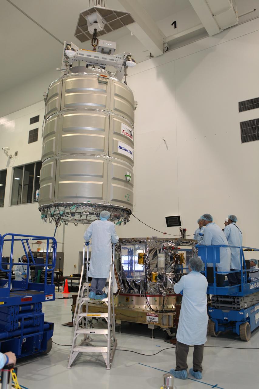 In the Space Station Processing Facility at NASA's Kennedy Space Center in Florida, technicians and engineers use a crane to move a Cygnus spacecraft's pressurized cargo module for mating to its service module. Cygnus is being prepared to deliver thousands of pounds of supplies, equipment and scientific research materials on the Orbital ATK CRS-7 mission to the International Space Station. Scheduled to launch on March 19, 2017, the commercial resupply services mission will lift off atop a United Launch Alliance Atlas V rocket from Space launch Complex 41 at Cape Canaveral Air Force Station.