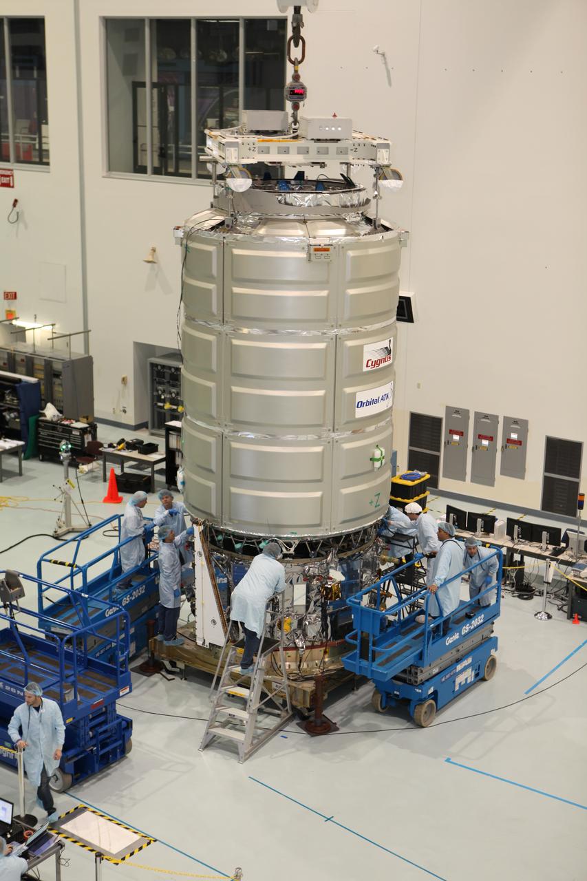 In the Space Station Processing Facility at NASA's Kennedy Space Center in Florida, technicians and engineers mate a Cygnus spacecraft's pressurized cargo module to its service module. Cygnus is being prepared to deliver thousands of pounds of supplies, equipment and scientific research materials on the Orbital ATK CRS-7 mission to the International Space Station. Scheduled to launch on March 19, 2017, the commercial resupply services mission will lift off atop a United Launch Alliance Atlas V rocket from Space launch Complex 41 at Cape Canaveral Air Force Station.