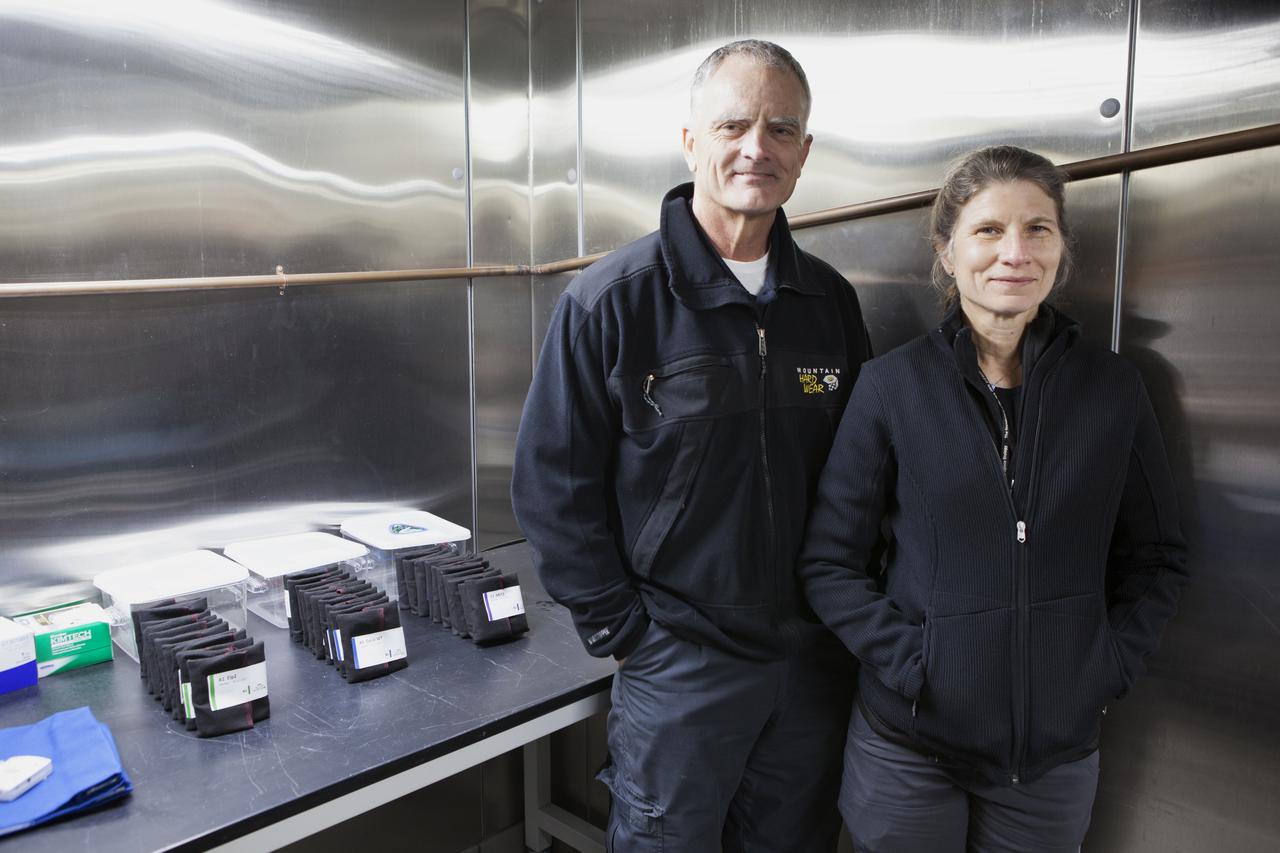 Drs. Rob Ferl and Anna-Lisa Paul in a cold room in the Kennedy Space Center Processing Facility with the petri plates they prepped at the University of Florida for APEX-04. Paul is the principal investigator (PI) and Ferl is co-PI. Apex-04 is an experiment involving Arabidopsis in petri plates inside the Veggie facility aboard the International Space Station. Since Arabidopsis is the genetic model of the plant world, it is a perfect sample organism for performing genetic studies in spaceflight. The experiment is the result of a grant from NASA’s Space Life and Physical Sciences division.