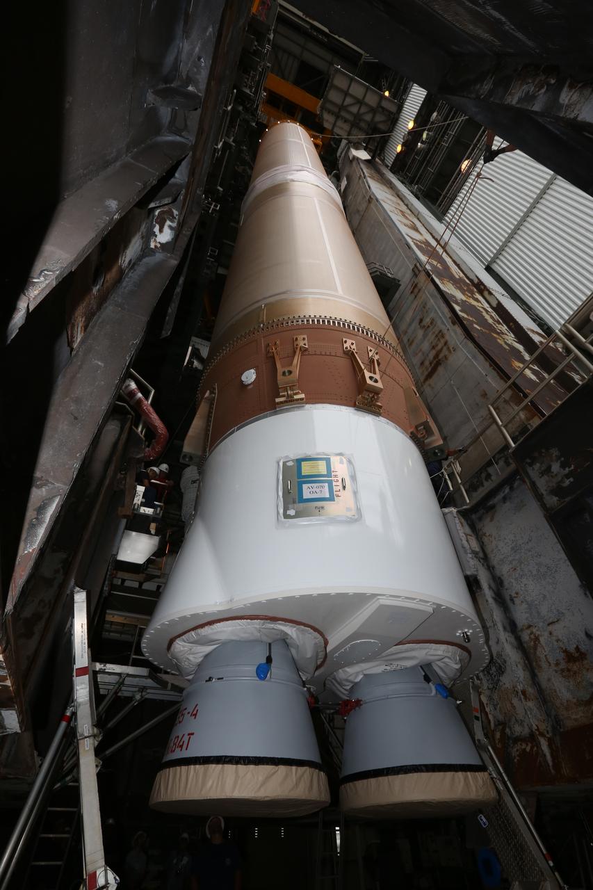 The first stage of the United Launch Alliance (ULA) Atlas V rocket is lifted up inside the Vertical Integration Facility at Space Launch Complex 41 at Cape Canaveral Air Force Station in Florida. The rocket is being prepared for Orbital ATK's seventh commercial resupply mission, CRS-7, to the International Space Station. Orbital ATK's CYGNUS pressurized cargo module is scheduled to launch atop ULA's Atlas V rocket from Pad 41 on March 19, 2017. CYGNUS will deliver thousands of pounds of supplies, equipment and scientific research materials to the space station.
