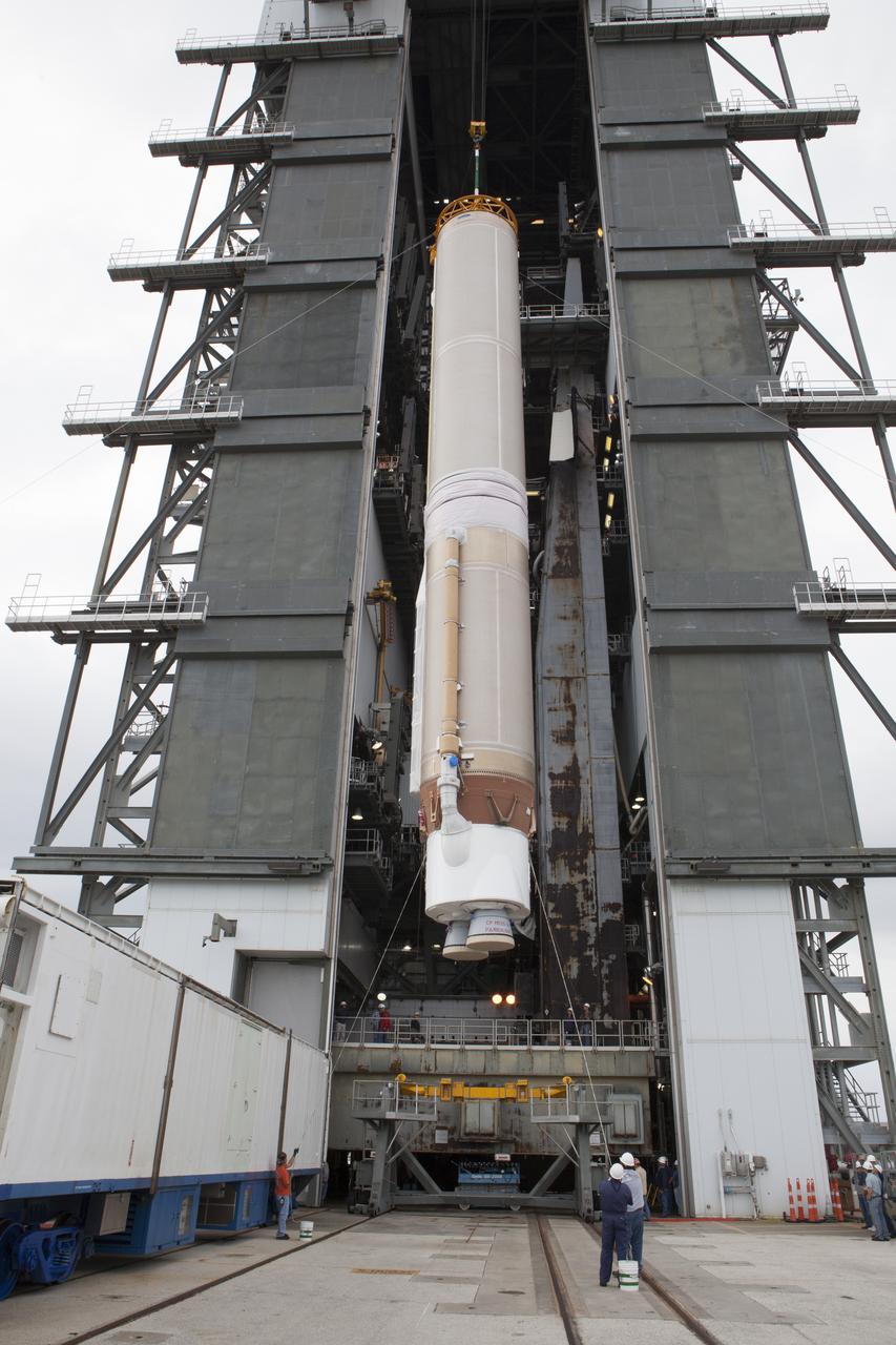 The first stage of the United Launch Alliance (ULA) Atlas V rocket is lifted to vertical as it is moved into the Vertical Integration Facility at Space Launch Complex 41 at Cape Canaveral Air Force Station in Florida. The rocket is being prepared for Orbital ATK's seventh commercial resupply mission, CRS-7, to the International Space Station. Orbital ATK's CYGNUS pressurized cargo module is scheduled to launch atop ULA's Atlas V rocket from Pad 41 on March 19, 2017. CYGNUS will deliver thousands of pounds of supplies, equipment and scientific research materials to the space station.