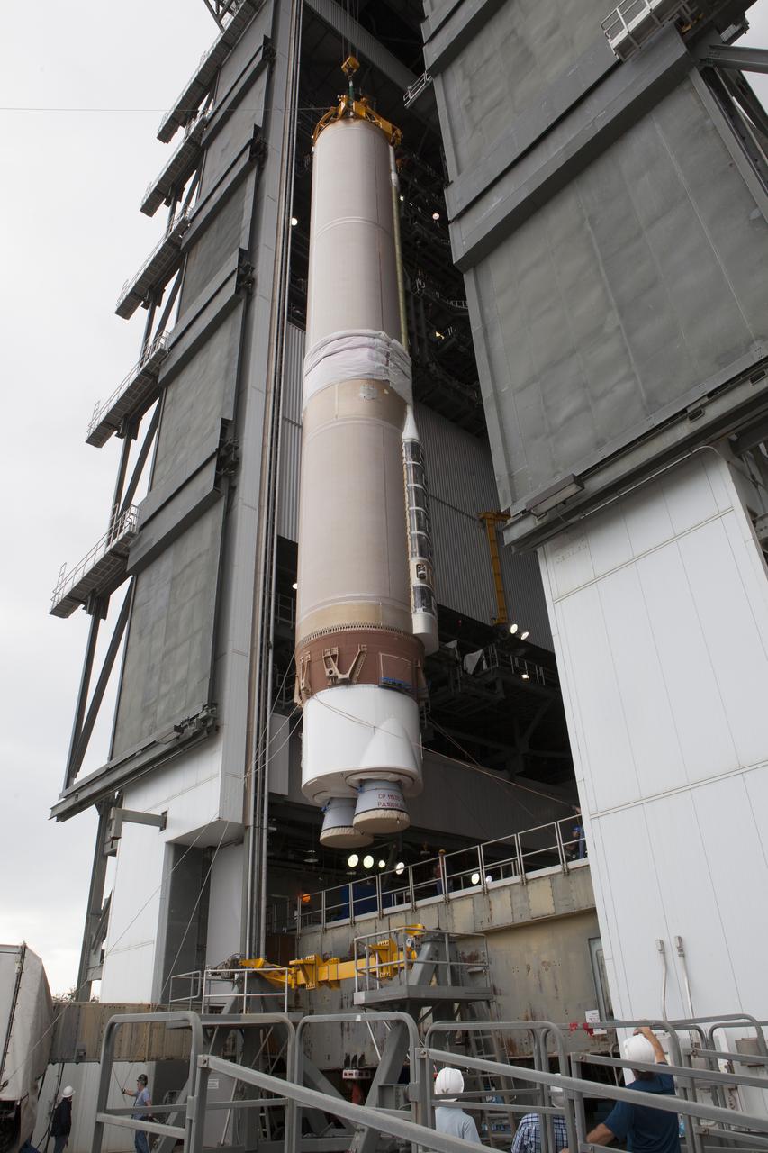 The first stage of the United Launch Alliance (ULA) Atlas V rocket is lifted to vertical and moved into the Vertical Integration Facility at Space Launch Complex 41 at Cape Canaveral Air Force Station in Florida. The rocket is being prepared for Orbital ATK's seventh commercial resupply mission, CRS-7, to the International Space Station. Orbital ATK's CYGNUS pressurized cargo module is scheduled to launch atop ULA's Atlas V rocket from Pad 41 on March 19, 2017. CYGNUS will deliver thousands of pounds of supplies, equipment and scientific research materials to the space station.