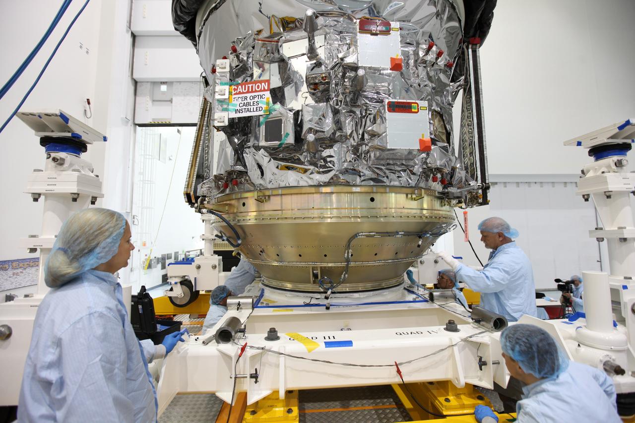 In the Space Station Processing Facility high bay at NASA's Kennedy Space Center in Florida, technicians secure the Orbital ATK CYGNUS pressurized cargo module on the KAMAG transporter. The module will be transported to the Payload Hazardous Servicing Facility. The Orbital ATK CRS-7 commercial resupply services mission to the International Space Station is scheduled to launch atop a United Launch Alliance Atlas V rocket from Space Launch Complex 41 at Cape Canaveral Air Force Station on March 19, 2017. CYGNUS will deliver thousands of pounds of supplies, equipment and scientific research materials to the space station. 