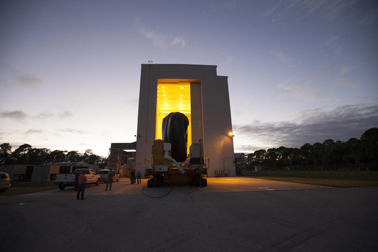 A KAMAG transporter with Orbital ATK's CYGNUS pressurized cargo module secured on top arrives at the Payload Hazardous Servicing Facility at NASA's Kennedy Space Center in Florida. CYGNUS will be moved inside the facility for final propellant loading and late cargo stowage. The Orbital ATK CRS-7 commercial resupply services mission to the International Space Station is scheduled to launch atop a United Launch Alliance Atlas V rocket from Space Launch Complex 41 at Cape Canaveral Air Force Station on March 19, 2017. CYGNUS will deliver thousands of pounds of supplies, equipment and scientific research materials to the space station. 