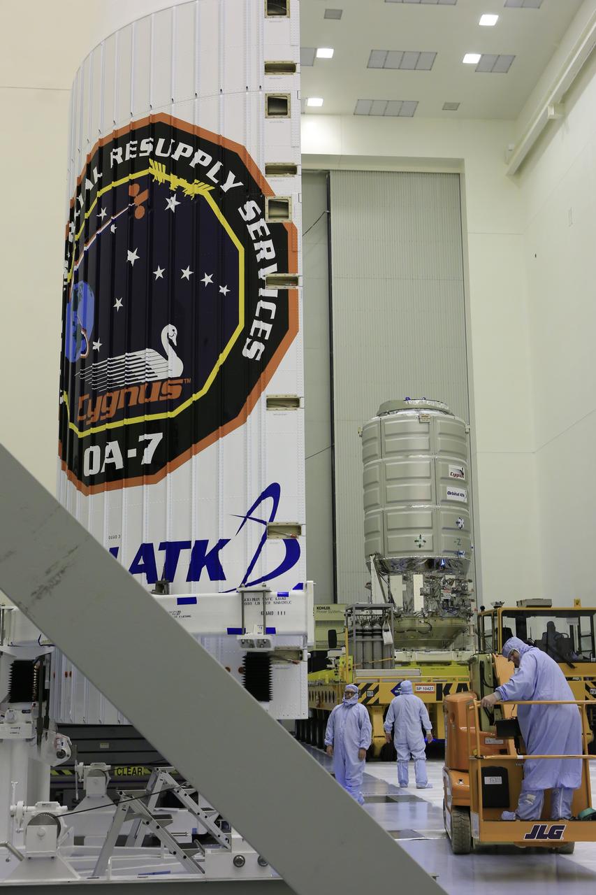 A KAMAG transporter with Orbital ATK's CYGNUS pressurized cargo module secured on top slowly moves from the airlock into the high bay of the Payload Hazardous Servicing Facility at NASA's Kennedy Space Center in Florida. Cygnus will be moved to a work stand for final propellant loading and late cargo stowage. The Orbital ATK CRS-7 commercial resupply services mission to the International Space Station is scheduled to launch atop a United Launch Alliance Atlas V rocket from Space Launch Complex 41 at Cape Canaveral Air Force Station on March 19, 2017. CYGNUS will deliver thousands of pounds of supplies, equipment and scientific research materials to the space station.