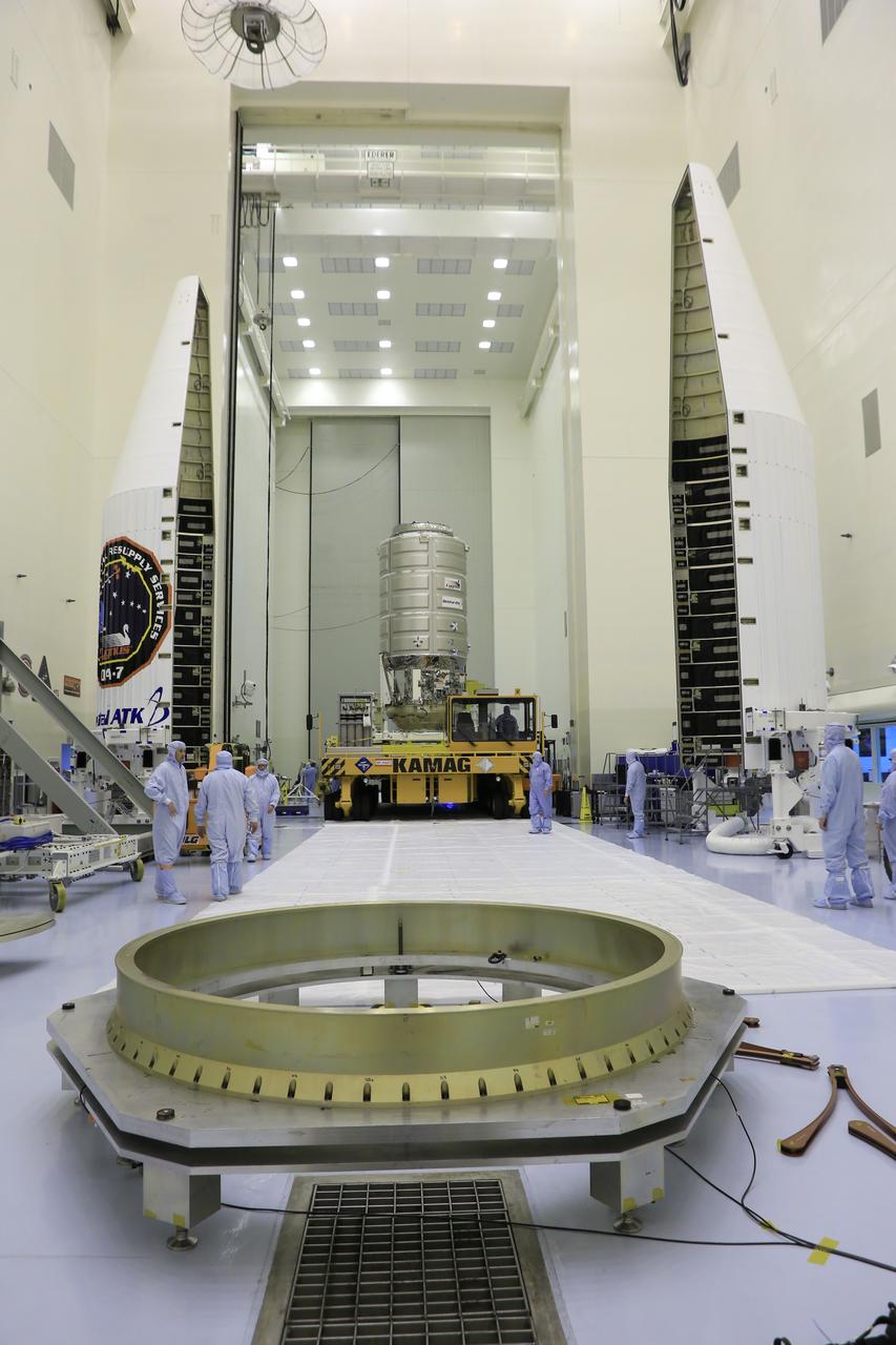 A KAMAG transporter with Orbital ATK's CYGNUS pressurized cargo module secured on top slowly moves from the airlock into the high bay of the Payload Hazardous Servicing Facility at NASA's Kennedy Space Center in Florida. Cygnus will be moved to a work stand for final propellant loading and late cargo stowage. The Orbital ATK CRS-7 commercial resupply services mission to the International Space Station is scheduled to launch atop a United Launch Alliance Atlas V rocket from Space Launch Complex 41 at Cape Canaveral Air Force Station on March 19, 2017. CYGNUS will deliver thousands of pounds of supplies, equipment and scientific research materials to the space station.