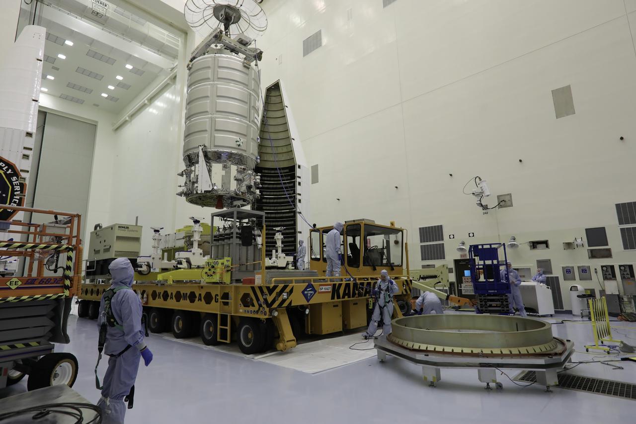 A crane lifts Orbital ATK's CYGNUS pressurized cargo module up from the KAMAG transporter inside the Payload Hazardous Servicing Facility at NASA's Kennedy Space Center in Florida. CYGNUS will be lowered onto a work stand for final propellant loading and late cargo stowage. The Orbital ATK CRS-7 commercial resupply services mission to the International Space Station is scheduled to launch atop a United Launch Alliance Atlas V rocket from Space Launch Complex 41 at Cape Canaveral Air Force Station on March 19, 2017. CYGNUS will deliver thousands of pounds of supplies, equipment and scientific research materials to the space station. 
