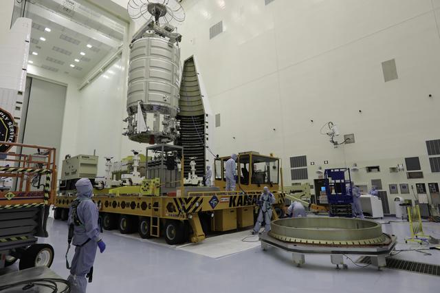 NASA image: OA-7 Lift to Stand inside PHSF