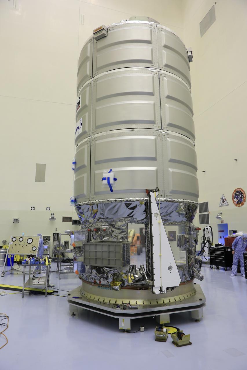 Inside the Payload Hazardous Servicing Facility at NASA's Kennedy Space Center in Florida, technicians have installed several Nanoracks on the exterior of the Orbital ATK Cygnus pressurized cargo module. The Orbital ATK CRS-7 commercial resupply services mission to the International Space Station is scheduled to launch atop a United Launch Alliance Atlas V rocket from Space Launch Complex 41 at Cape Canaveral Air Force Station no earlier than March 21, 2017. Cygnus will deliver 7,600 pounds of supplies, equipment and scientific research materials to the space station.