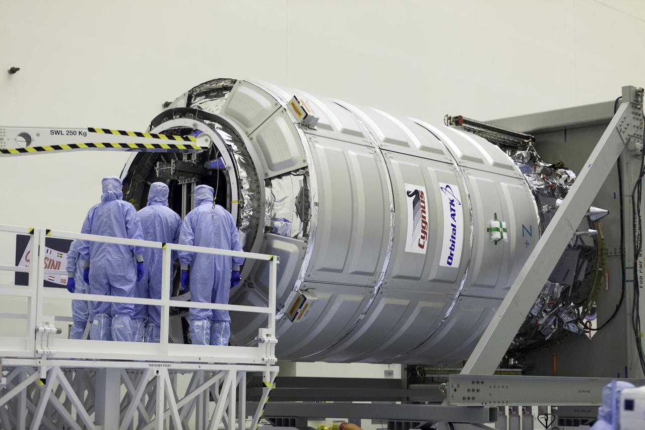Inside the Payload Hazardous Servicing Facility at NASA's Kennedy Space Center in Florida, technicians have opened the hatch on the Orbital ATK Cygnus pressurized cargo module to prepare for late stowage of supplies and hardware. The Orbital ATK CRS-7 commercial resupply services mission to the International Space Station is scheduled to launch atop a United Launch Alliance Atlas V rocket from Space Launch Complex 41 at Cape Canaveral Air Force Station targeted for March 24, 2017. Cygnus will deliver 7,600 pounds of supplies, equipment and scientific research materials to the space station. 