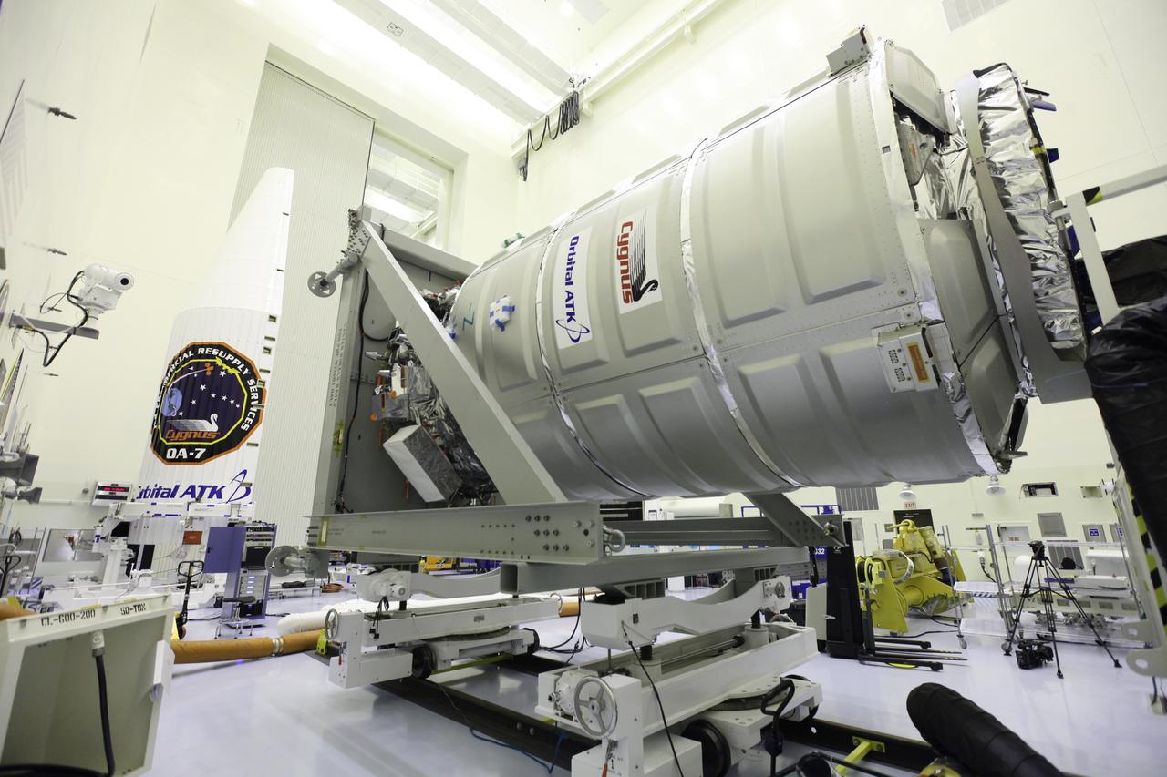 Inside the Payload Hazardous Servicing Facility at NASA's Kennedy Space Center in Florida, the Orbital ATK Cygnus pressurized cargo module is tilted to the horizontal position to prepare for final stowage of powered cargo. The Orbital ATK CRS-7 commercial resupply services mission to the International Space Station is scheduled to launch atop a United Launch Alliance Atlas V rocket from Space Launch Complex 41 at Cape Canaveral Air Force Station targeted for March 24, 2017. Cygnus will deliver 7,600 pounds of supplies, equipment and scientific research materials to the space station.
