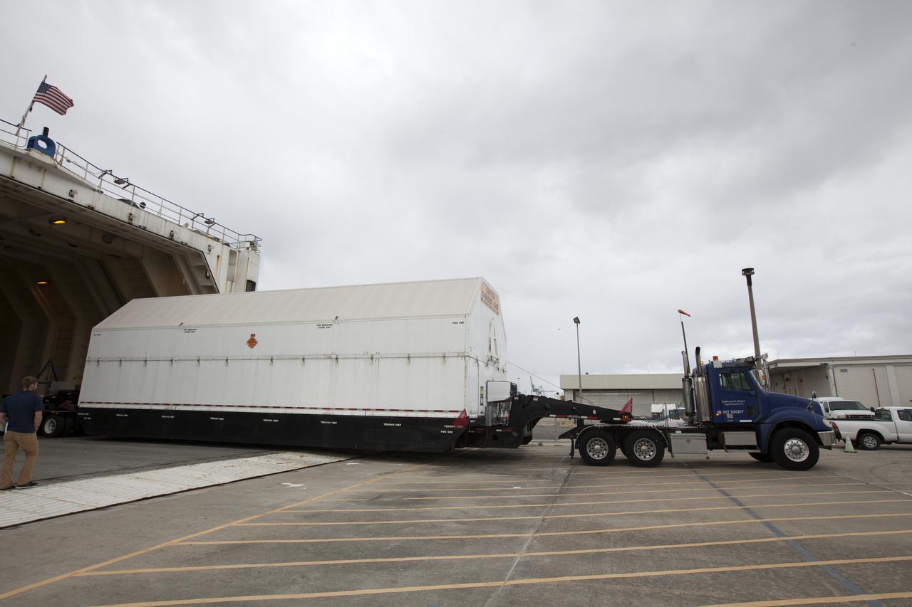 The first integrated piece of flight hardware for NASA's Space Launch System (SLS) rocket, the Interim Cryogenic Propulsion Stage (ICPS) is offloaded from the Mariner barge at Cape Canaveral Air Force Station in Florida. The ICPS was shipped from the United Launch Alliance (ULA) facility in Decatur, Alabama. The ICPS will be transported to the ULA Horizontal Integration Facility where it will be removed from its flight case. The ICPS is the in-space stage that is located toward the top of the rocket, between the Launch Vehicle Stage Adapter and the Orion Spacecraft Adapter. It will provide some of the in-space propulsion during Orion's first flight test atop the SLS on Exploration Mission 1.