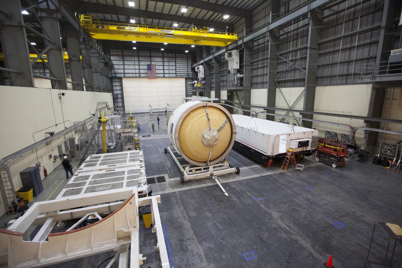 Inside the United Launch Alliance (ULA) Horizontal Integration Facility at Cape Canaveral Air Force Station in Florida, the Interim Cryogenic Propulsion Stage (ICPS) for NASA's Space Launch System rocket was removed from its shipping container and then lowered and secured onto a movable transport stand. The ICPS is the first integrated piece of flight hardware to arrive for the SLS. The ICPS arrived from the ULA facility in Decatur, Alabama. The ICPS is the in-space stage that is located toward the top of the rocket, between the Launch Vehicle Stage Adapter and the Orion Spacecraft Adapter. It will provide some of the in-space propulsion during Orion's first flight test atop the SLS on Exploration Mission 1. 