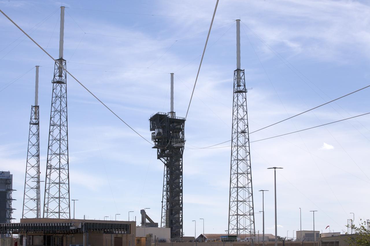 The cables that make up the Emergency Egress System at Space Launch Complex 41 are in place as United Launch Alliance and Boeing continue modifications to the pad in order to host missions by the Boeing CST-100 Starliner carrying astronauts and crew. The system recently completed its final test. In the unlikely event of an emergency prior to liftoff, each person on the Crew Access Tower would get into their own seat attached to the wire and slide more than 1,340 feet to a safe area. The wires are situated 172 feet above the pad deck on level 12 of the tower. The Starliner will launch on a ULA Atlas V on mission to low-Earth orbit including those flying astronauts to the International Space Station during missions by NASA's Commercial Crew Program.