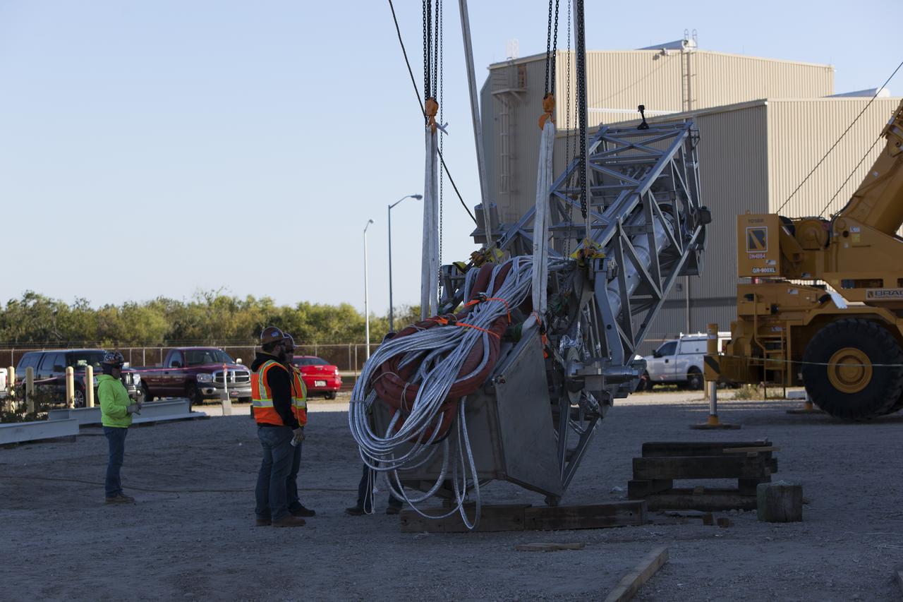 Preparations are underway to lift the Orion Service Module Umbilical (OSMU) up for installation on the mobile launcher tower at NASA's Kennedy Space Center in Florida. The mobile launcher tower will be equipped with a number of lines, called umbilicals, that will connect to the Space Launch System rocket and Orion spacecraft for Exploration Mission-1 (EM-1). The OSMU will be located high on the mobile launcher tower and, prior to launch, will transfer liquid coolant for the electronics and air for the Environmental Control System to the Orion service module that houses these critical systems to support the spacecraft. EM-1 is scheduled to launch in 2018. The Ground Systems Development and Operations Program is overseeing installation of the umbilicals. 