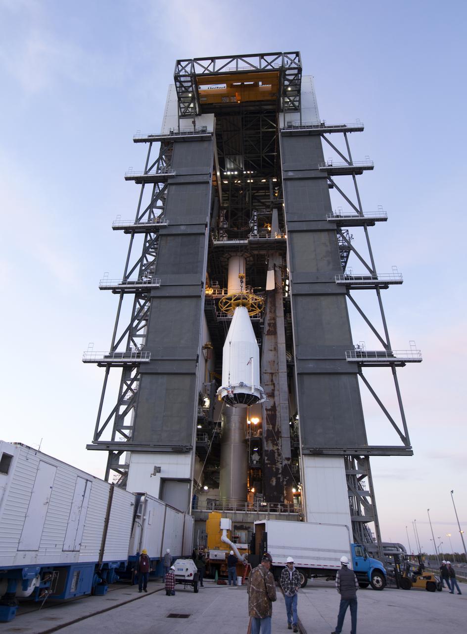 The payload fairing containing the Orbital ATK Cygnus pressurized cargo module is lifted by crane at the United Launch Alliance (ULA) Vertical Integration Facility at Space Launch Complex 41 at Cape Canaveral Air Force Station in Florida. The payload will be hoisted up and mated to the ULA Atlas V rocket. The Orbital ATK CRS-7 commercial resupply services mission to the International Space Station is scheduled to launch atop the Atlas V from pad 41. Cygnus will deliver 7,600 pounds of supplies, equipment and scientific research materials to the space station. 