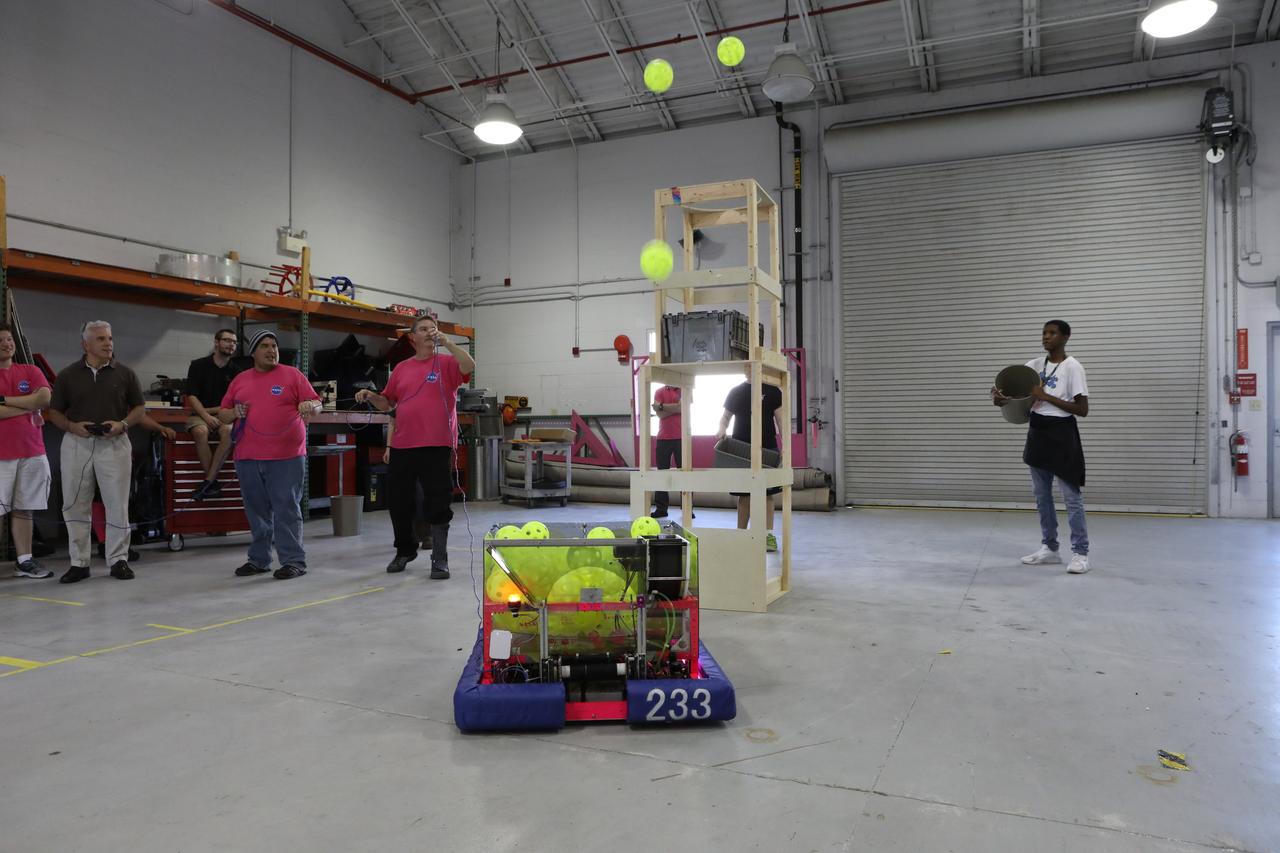 Comprised of students from Cocoa Beach, Rockledge, Viera and Space Coast high schools, the robotics group known as the "Pink Team," its mentors and support personnel celebrated a successful season near the Shuttle Landing Facility at NASA's Kennedy Space Center on April 5. The Pink Team fared well in the two regionals it competed in this year in West Palm Beach, Florida, and the University of Central Florida in Orlando.