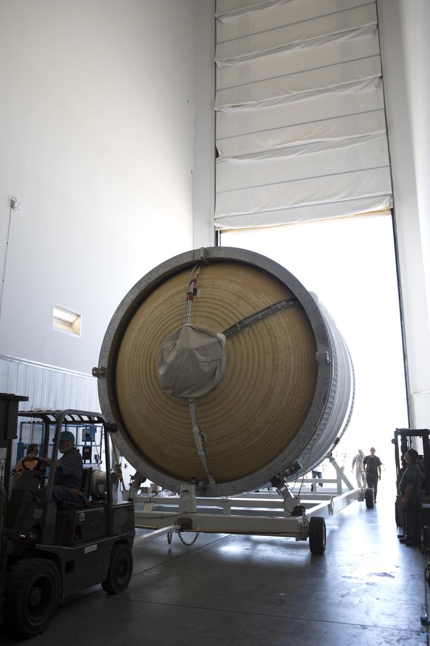 The Interim Cryogenic Propulsion Stage (ICPS) for NASA's Space Launch System rocket is moved inside the Delta Operations Center at Cape Canaveral Air Force Station in Florida. The ICPS was moved from the United Launch Alliance (ULA) Horizontal Integration Facility near Space Launch Complex 37 at the Cape. The ICPS is the first integrated piece of flight hardware to arrive for the SLS. It is the in-space stage that is located toward the top of the rocket, between the Launch Vehicle Stage Adapter and the Orion Spacecraft Adapter. It will provide some of the in-space propulsion during Orion's first flight test atop the SLS on Exploration Mission-1. 