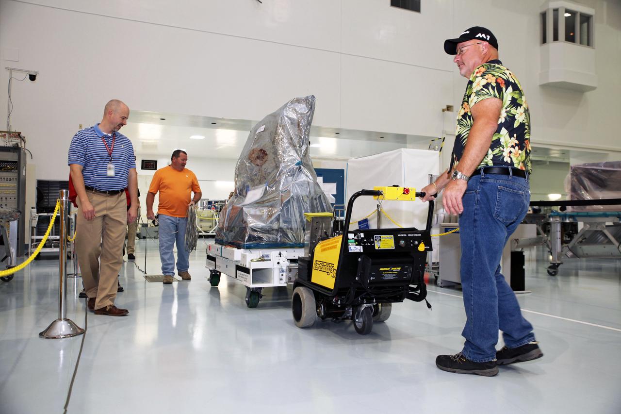 Inside the Space Station Processing Facility high bay at NASA's Kennedy Space Center in Florida, the Multiple User System for Earth Sensing, or MUSES, payload is being prepared for transfer out of the high bay. MUSES will be delivered to the International Space Station aboard the SpaceX Dragon cargo carrier on the company’s 11th commercial resupply services mission to the space station. MUSES, developed by Teledyne Brown, is part of the company's new commercial space-based digital imaging business. MUSES hosts earth-viewing instruments, such as high-resolution digital cameras, hyperspectral imagers, and provides precision pointing and other accommodations.