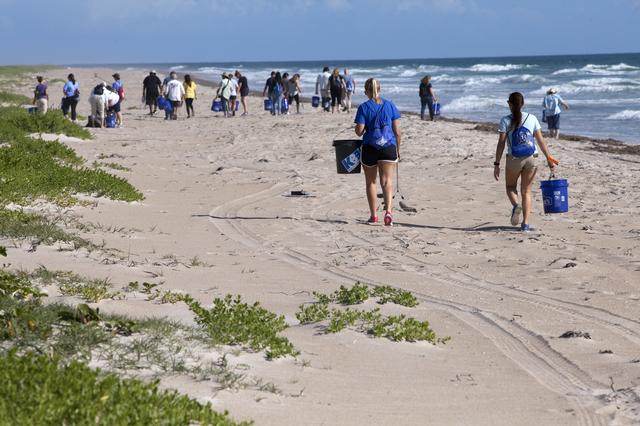 NASA image: Beach Clean-Up near Historic Beach House