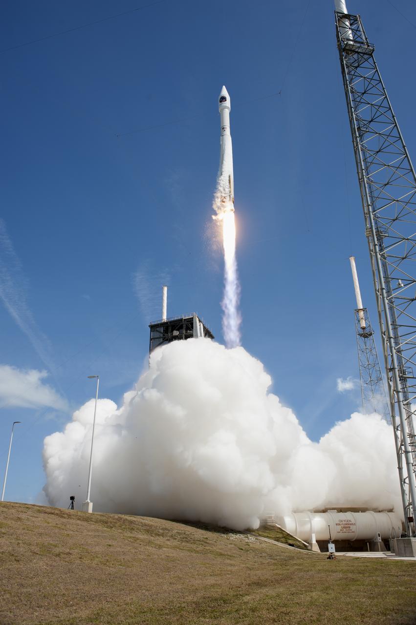 Against the backdrop of a bright blue sky, a United Launch Alliance Atlas V rocket soars upward after liftoff from Space Launch Complex 41 at Cape Canaveral Air Force Station in Florida, carrying the Orbital ATK Cygnus pressurized cargo module on the company's seventh commercial resupply services mission to the International Space Station. Liftoff was at 11:11 a.m. EDT. Cygnus will deliver 7,600 pounds of supplies, equipment and scientific research materials to the space station. 