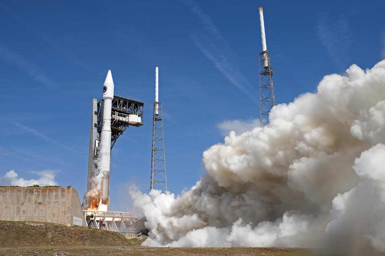 With blue sky for a background, the Orbital ATK Cygnus pressurized cargo module is carried atop the United Launch Alliance Atlas V rocket from Space Launch Complex 41 at Cape Canaveral Air Force Station in Florida. Orbital ATK's seventh commercial resupply services mission, CRS-7, will deliver 7,600 pounds of supplies, equipment and scientific research materials to the International Space Station. Liftoff was at 11:11 a.m. EDT. 