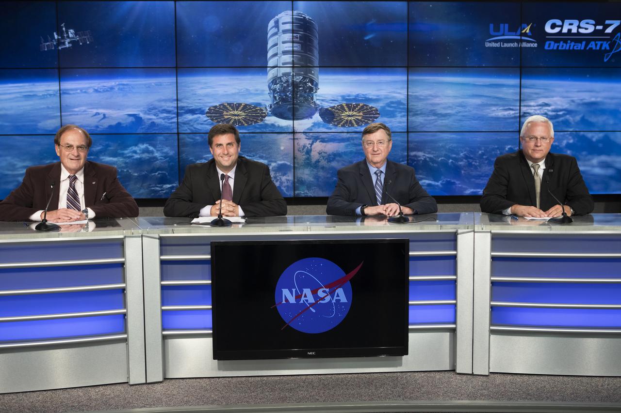 Members of the news media attend a press conference at NASA's Kennedy Space Center in Florida, after the launch of the Orbital ATK Cygnus pressurized cargo module atop a United Launch Alliance Atlas V rocket from Space Launch Complex 41 at Cape Canaveral Air Force Station. It was Orbital ATK's seventh commercial resupply services mission to the International Space Station. Liftoff was at 11:11 a.m. EDT. Speaking to the media are, from left, George Diller, NASA Kennedy Communications; Joel Montalbano, deputy manager, International Space Station Program, NASA Johnson Space Center in Houston; Frank Culbertson, president, Orbital ATK Space Systems Group; and Vern Thorp, program manager, commercial missions, United Launch Alliance.