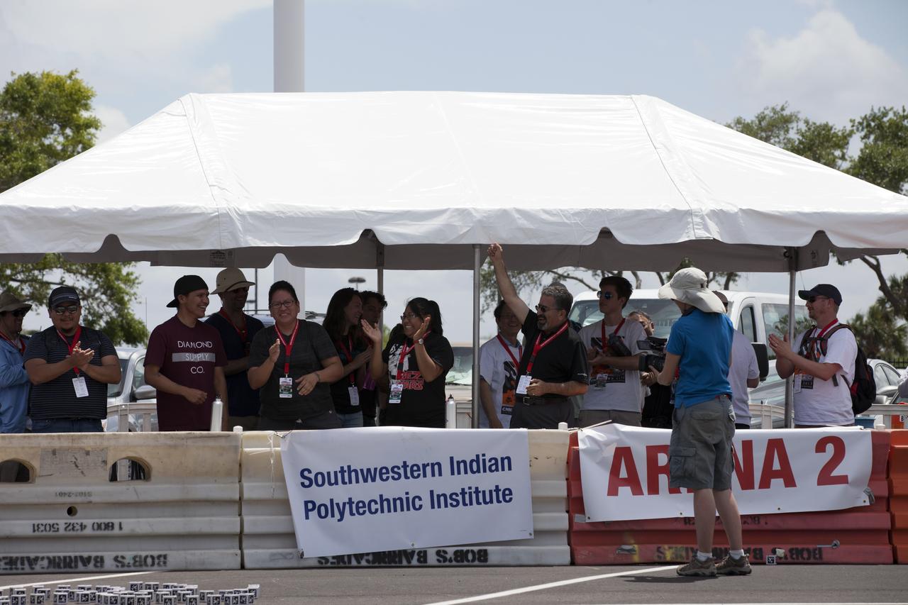 Students from Southwestern Indian Polytechnic Institute in Albuquerque, New Mexico, celebrate having captured first place and a $5,000 cash prize in the 2017 Swarmathon. The event at the Kennedy Space Center Visitor Complex may lead to developing technology that could revolutionize space exploration by more effectively and efficiently locating hidden resources while astronauts explore distant destinations.
