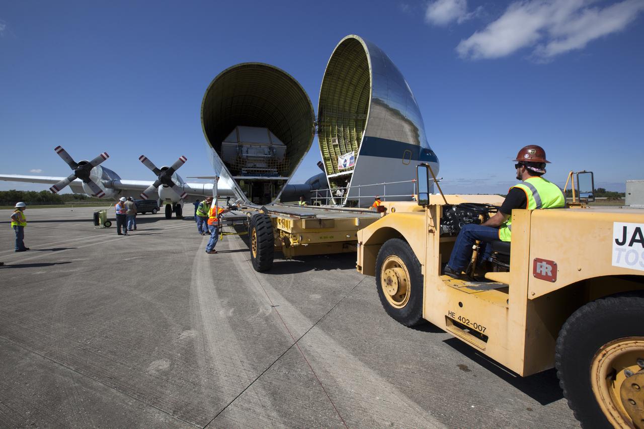 The Orion Exploration Mission-1 (EM-1) structural test article, inside its transport container, is secured in NASA's Super Guppy aircraft at the Shuttle Landing Facility at NASA's Kennedy Space Center in Florida. The test article will be transported to Lockheed Martin's Denver facility for testing. The Orion spacecraft will launch atop NASA’s Space Launch System rocket on EM-1, its first deep space mission.