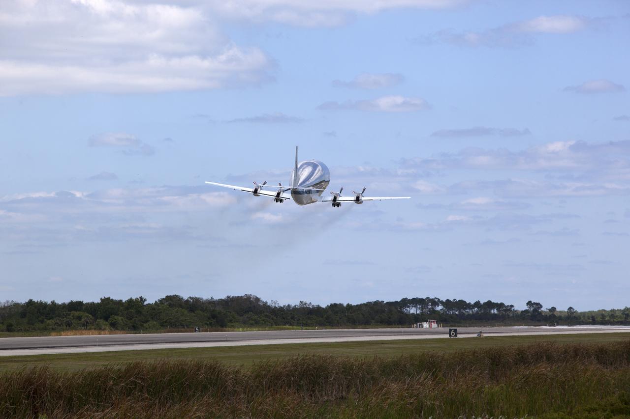 NASA's Super Guppy aircraft takes off from the runway at the Shuttle Landing Facility at NASA's Kennedy Space Center in Florida. The Orion Exploration Mission-1 (EM-1) structural test article, secured inside the Super Guppy, will be transported to Lockheed Martin's Denver facility for testing. The Orion spacecraft will launch atop NASA’s Space Launch System rocket on EM-1, its first deep space mission.
