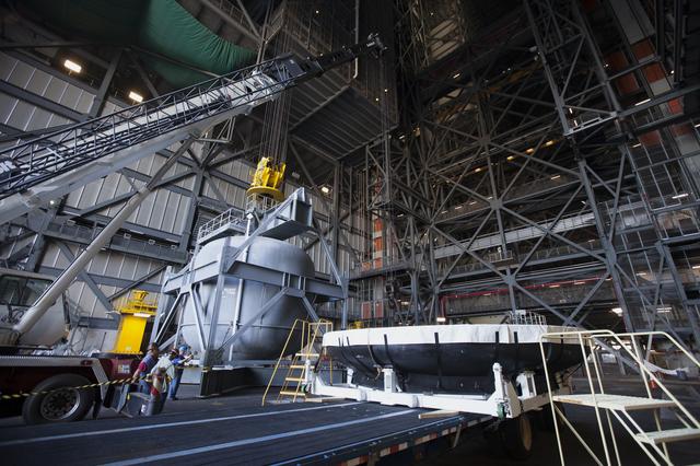 NASA image: Orion EFT-1 Heat Shield Offload from Truck onto Foam Pads (Dunna