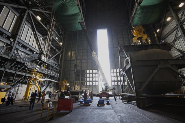 NASA image: Orion EFT-1 Heat Shield Offload from Truck onto Foam Pads (Dunna