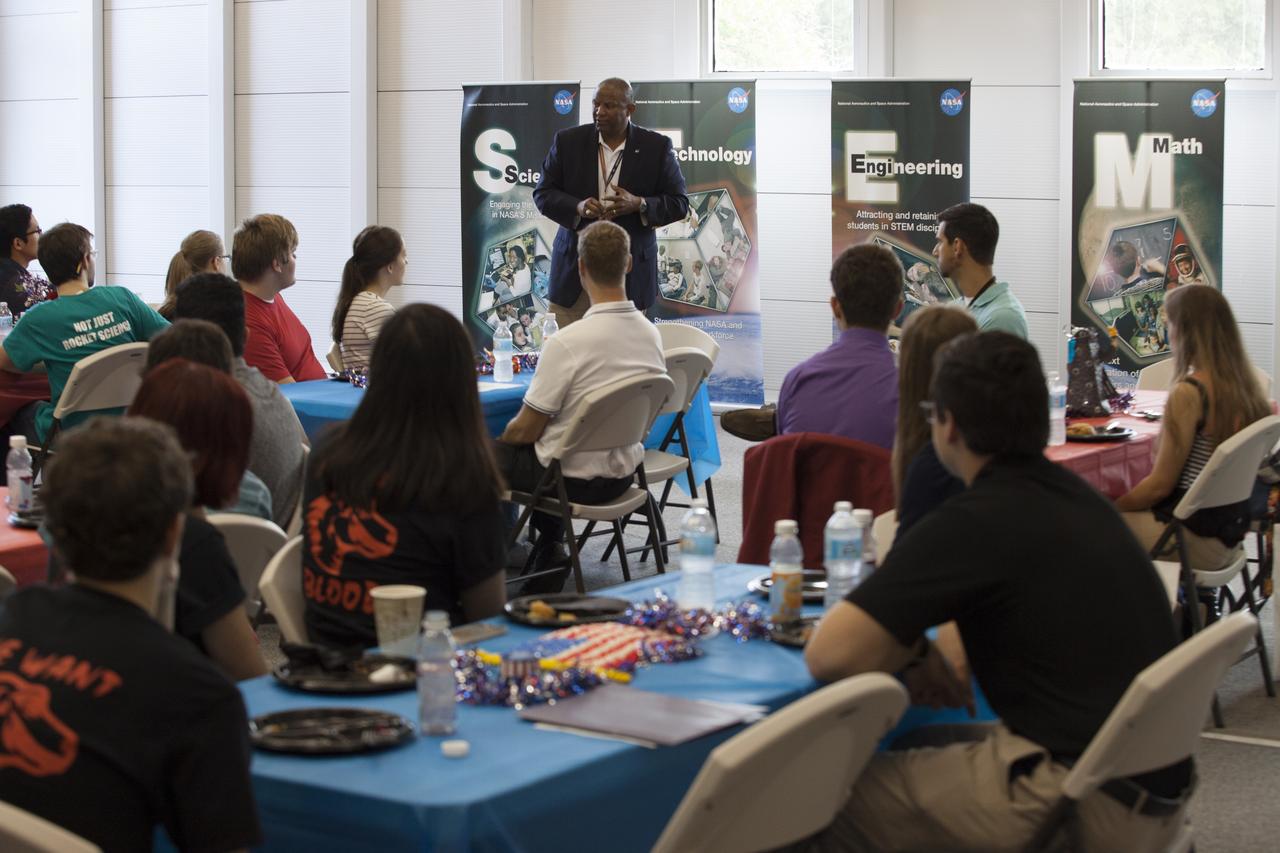 Kennedy Space Center Associate Director Kelvin Manning addresses about 40 Brevard County high school seniors regarding NASA's and Kennedy’s roles and missions during Brevard Top Scholars Day at Kennedy Space Center on May 5. Kennedy's Office of Education coordinated the event that featured a special behind-the-scenes tour of Kennedy, including prototype shops, cryogenic labs and facilities such as the Vehicle Assembly Building and the Launch Control Center firing rooms.  