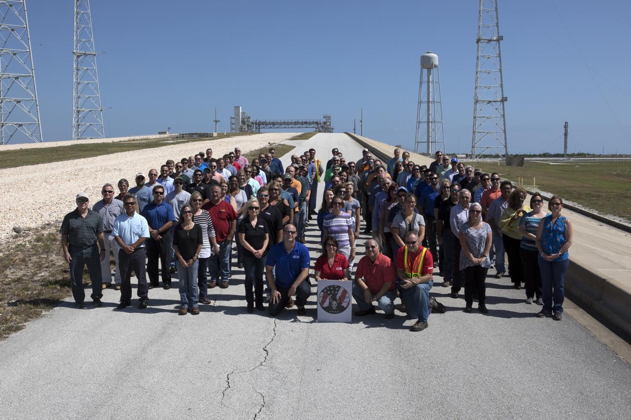 Launch Complex 39B current and past NASA and contractor workers gathered at pad B to mark the 50th anniversary of the launch complex at NASA's Kennedy Space Center in Florida. Upgrades to the surface of pad B, as well as the systems below and surrounding the pad will support the new processing and launch requirements for NASA's Space Launch System (SLS) and the Orion spacecraft for deep-space missions, including the journey to Mars. The modifications and improvements to processing and launch facilities will support Kennedy as a multi-user spaceport for government and commercial launches for years to come. The Ground Systems Development and Operations Program is overseeing upgrades and modifications to Pad 39B.