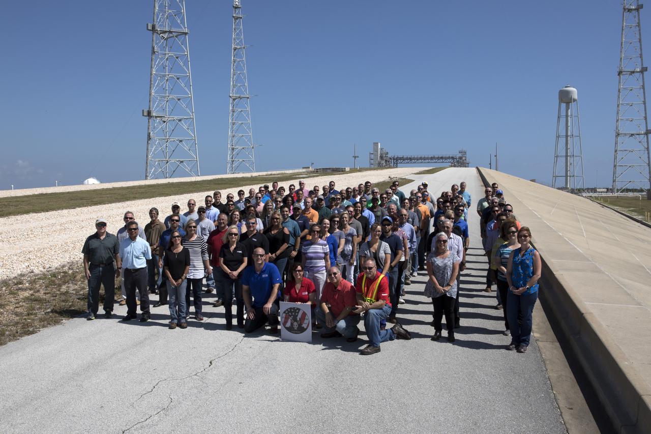 Launch Complex 39B current and past NASA and contractor workers gathered at pad B to mark the 50th anniversary of the launch complex at NASA's Kennedy Space Center in Florida. Upgrades to the surface of pad B, as well as the systems below and surrounding the pad will support the new processing and launch requirements for NASA's Space Launch System (SLS) and the Orion spacecraft for deep-space missions, including the journey to Mars. The modifications and improvements to processing and launch facilities will support Kennedy as a multi-user spaceport for government and commercial launches for years to come. The Ground Systems Development and Operations Program is overseeing upgrades and modifications to Pad 39B.