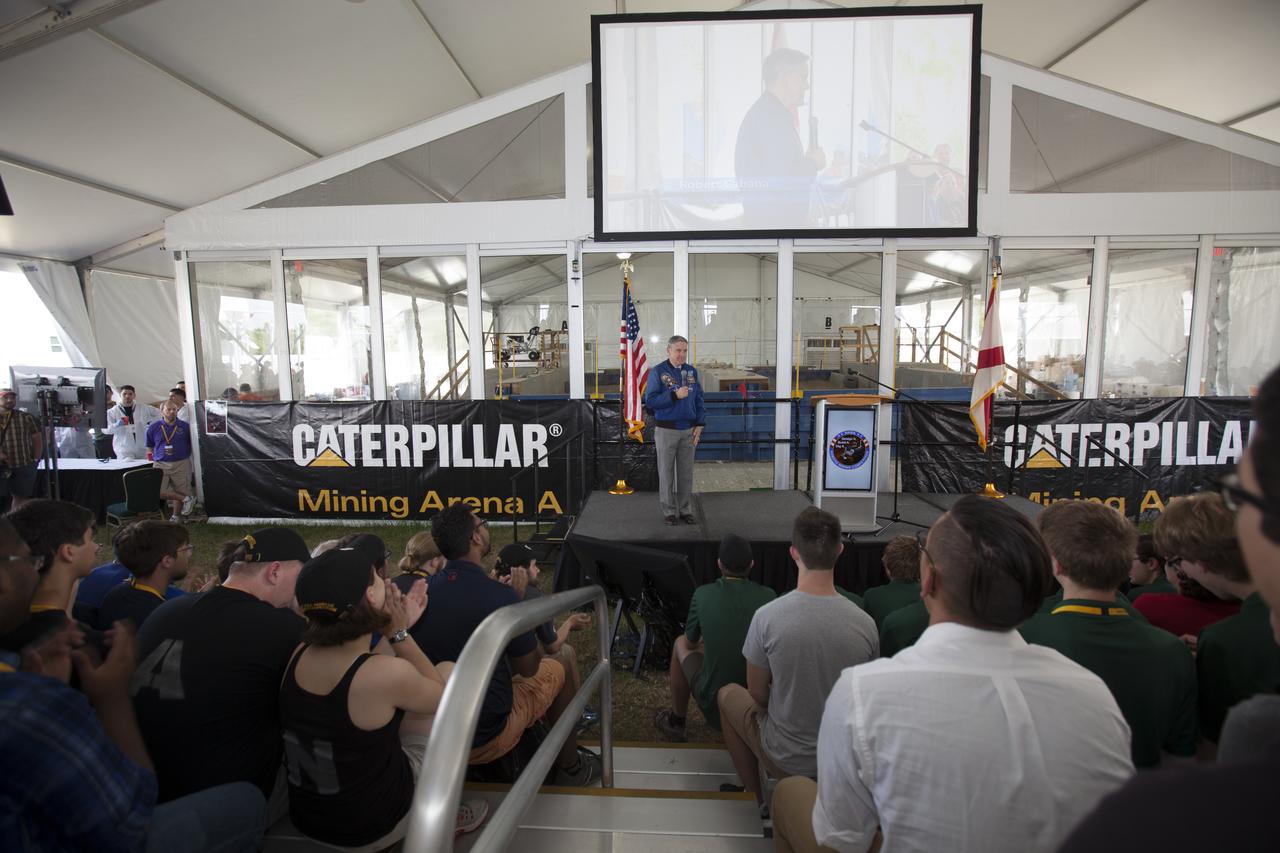 NASA Kennedy Space Center Director Bob Cabana welcomes participants to the agency's 8th Annual Robotic Mining Competition at the Kennedy Space Center Visitor Complex in Florida. More than 40 student teams from colleges and universities around the U.S. will use their mining robots to dig in a supersized sandbox filled with BP-1, or simulated Martian soil, and participate in other competition requirements. The Robotic Mining Competition is a NASA Human Exploration and Operations Mission Directorate project designed to encourage students in science, technology, engineering and math, or STEM fields. The project provides a competitive environment to foster innovative ideas and solutions that could be used on NASA's Journey to Mars. 