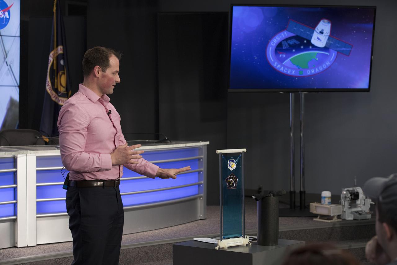 Jeremy Banik, principle investigator the Roll-Out Solar Array, or ROSA, demonstration, speaks to members of social media in the Kennedy Space Center’s Press Site auditorium. The briefing focused on experiments and instruments to be delivered to the International Space Station on SpaceX CRS-11. A Dragon spacecraft is scheduled to be launched from Kennedy’s Launch Complex 39A on June 1 atop a SpaceX Falcon 9 rocket on the company's 11th Commercial Resupply Services mission to the space station.