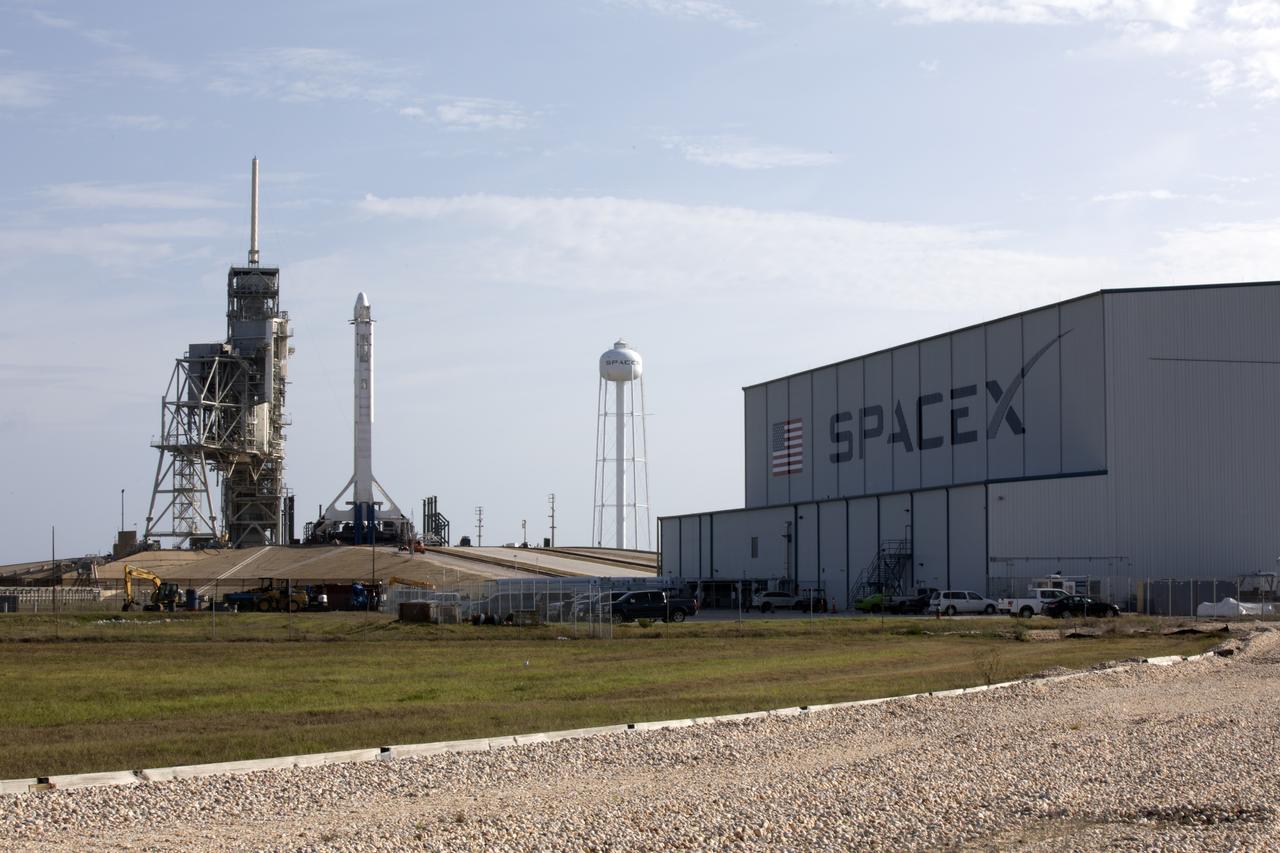 As a Falcon 9 rocket stands ready for liftoff at the Kennedy Space Center's Launch Complex 39A. The rocket will boost a Dragon resupply spacecraft to the International Space Station. Liftoff is scheduled for 5:55 p.m. EDT. On its 11th commercial resupply services mission to the space station, Dragon will bring up 6,000 pounds of supplies, such as the Neutron star Interior Composition Explorer, or NICER, instrument to study the extraordinary physics of neutron stars. 