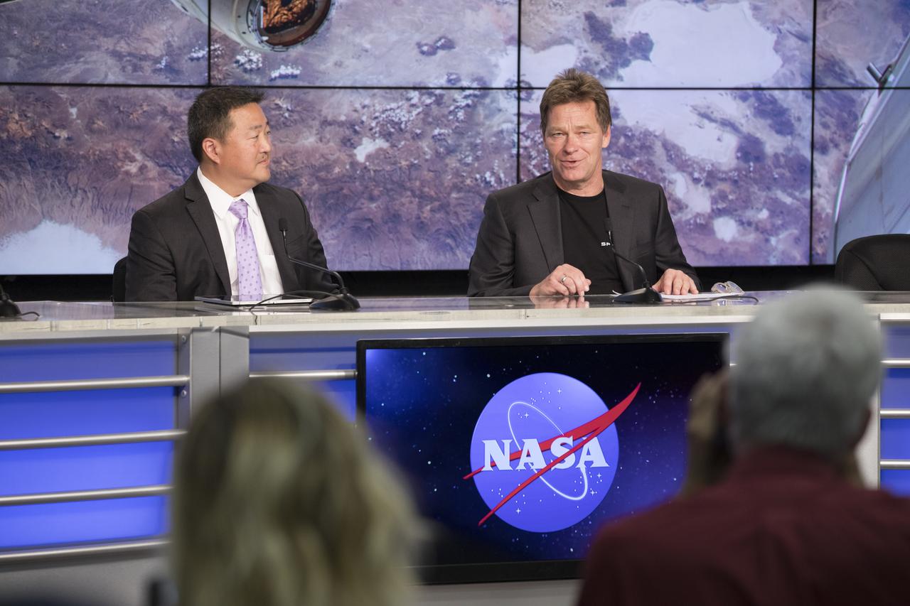 In the Press Site auditorium of NASA's Kennedy Space Center in Florida, NASA and industry leaders speak to media at a post-launch news conference following the liftoff of SpaceX CRS-11, a commercial resupply services mission to the International Space Station. From left are: Ven Feng, NASA's manager of the International Space Station Transportation Integration Office, and Hans Koenigsmann, vice president of Flight Reliability for SpaceX. SpaceX CRS-11 lifted off atop a Falcon 9 rocket from Kennedy's Launch Complex 39A at 5:07 p.m. EDT.