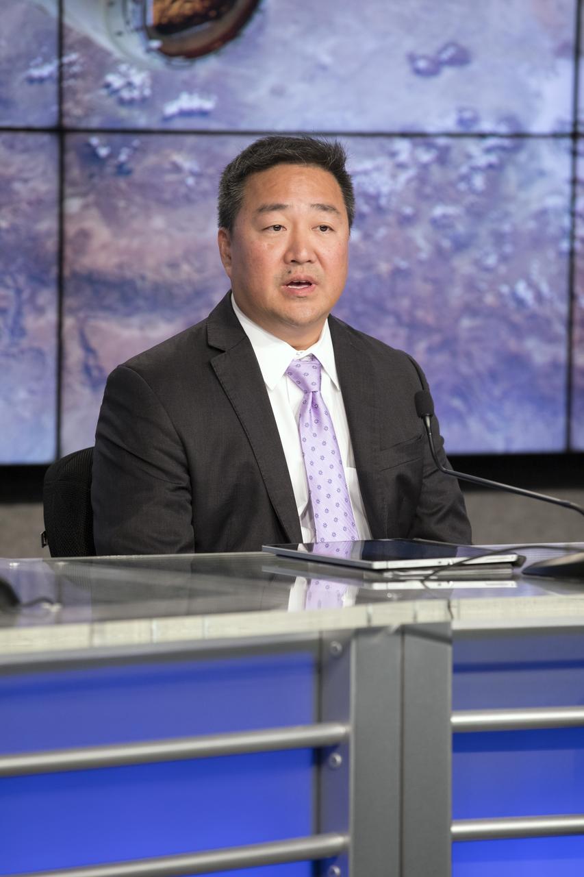 In the Press Site auditorium of NASA's Kennedy Space Center in Florida, Ven Feng, NASA's manager of the International Space Station Transportation Integration Office, speaks to media at a post-launch news conference following the liftoff of SpaceX CRS-11, a commercial resupply services mission to the International Space Station. SpaceX CRS-11 lifted off atop a Falcon 9 rocket from Kennedy's Launch Complex 39A at 5:07 p.m. EDT.