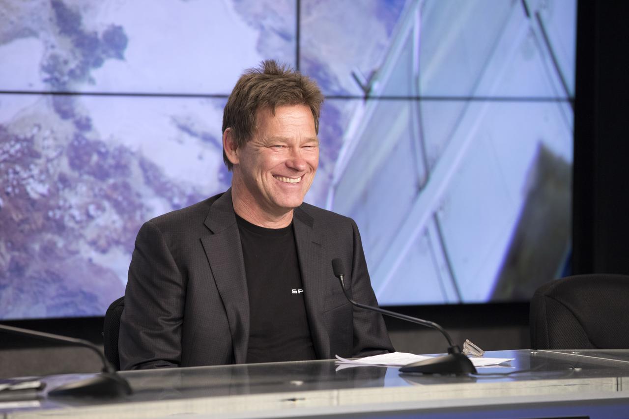 In the Press Site auditorium of NASA's Kennedy Space Center in Florida, Hans Koenigsmann, vice president of Flight Reliability for SpaceX. SpaceX, speaks to media at a post-launch news conference following the liftoff of SpaceX CRS-11, a commercial resupply services mission to the International Space Station. SpaceX CRS-11 lifted off atop a Falcon 9 rocket from Kennedy's Launch Complex 39A at 5:07 p.m. EDT.